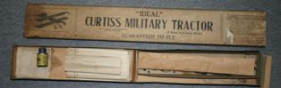 An Ideal Model Kit for a Curtiss Military Tractor in its original box.  While the kit still contains the plans, rubber motors, and a small aluminum bottle of Ambroid Cement, there are no wood pieces, or other components.   (Source: National Model Aviation Museum, donated by Dr. Vern McIntosh, 2007.43.04.)